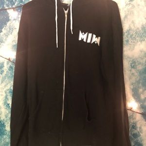 Motionless in white zip up sweater